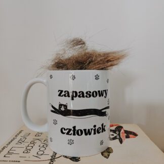 Koci kubek: Zapasowy człowiek